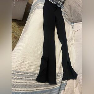 ALO black tights with leg flare on bottom size small good shape